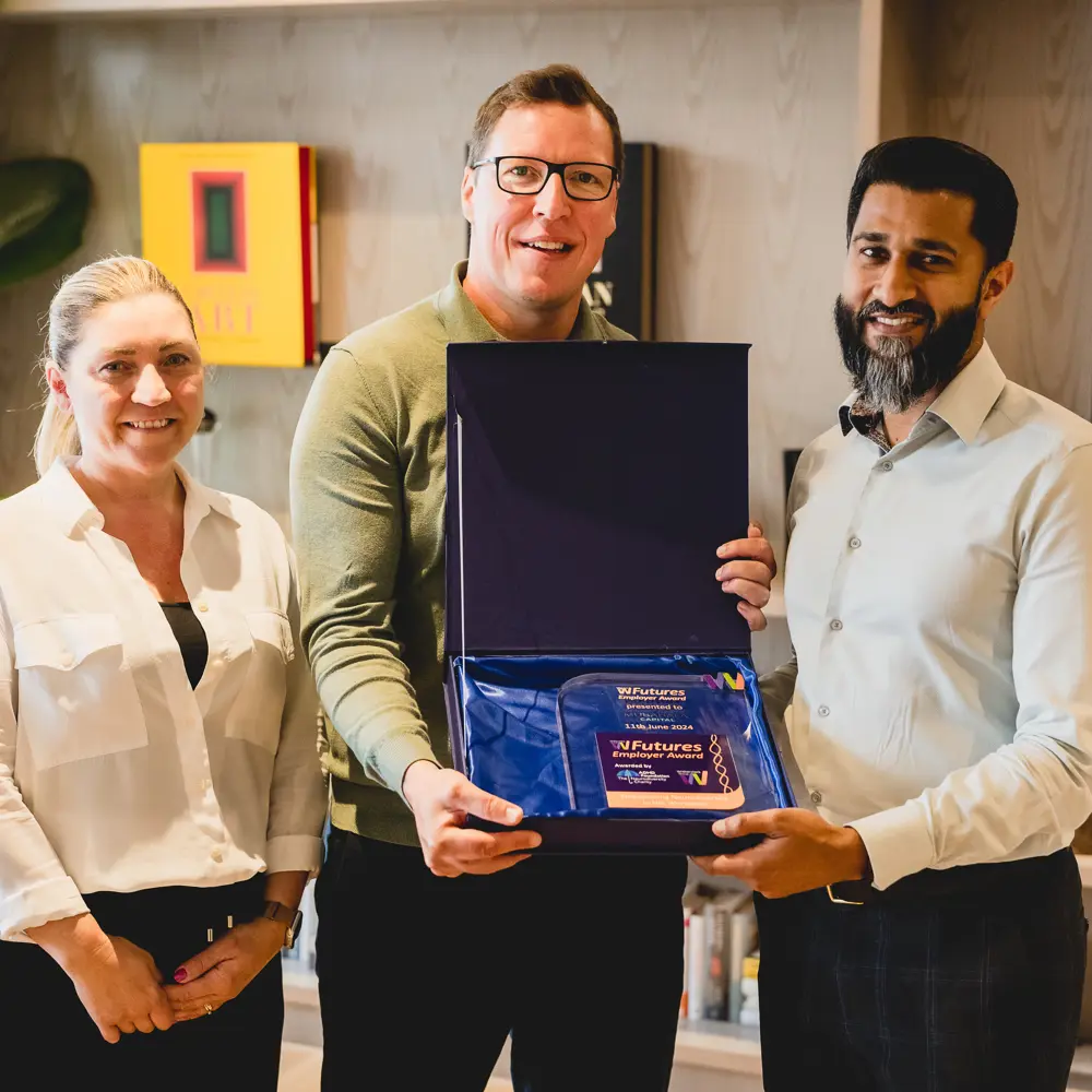 Head of Futures presenting the Futures Employer Award to Mubadala